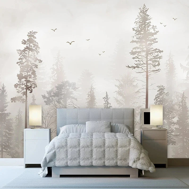 Papier peint panoramique Forêt brumeuse aux oiseaux : pins et sapins dans une brume grège rosée, vol d'oiseaux, posé dans une chambre