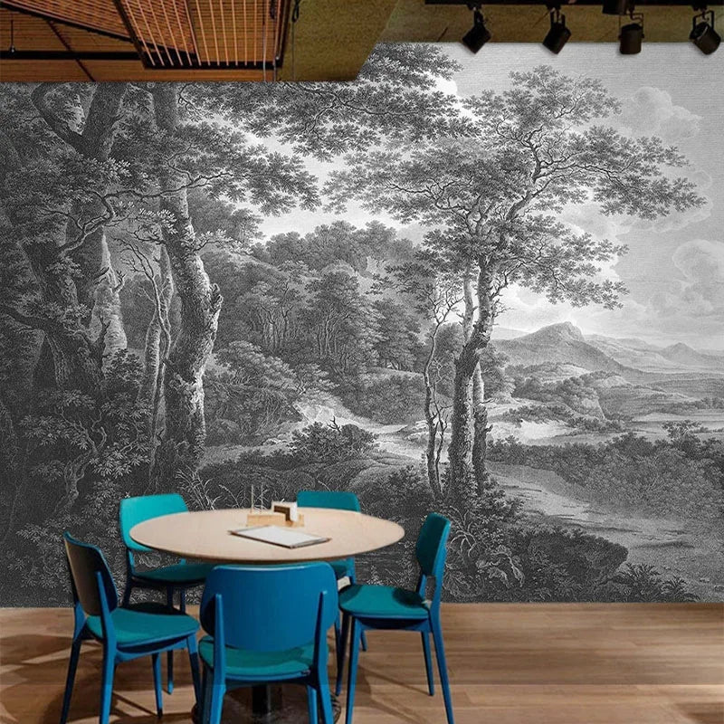 Papier peint panoramique Forêt ancienne noir et blanc : sous-bois gravé en noir et blanc, grands arbres et vallée, posé dans une salle à manger