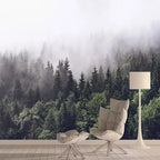 Papier peint panoramique Sapins dans le brouillard : forêt de sapins vert sombre dans le brouillard, posé dans un salon