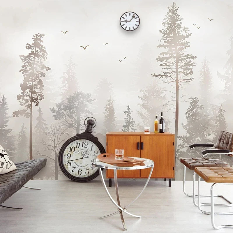 Papier peint panoramique Forêt brumeuse aux oiseaux : pins et sapins dans une brume grège rosée, vol d'oiseaux, posé dans un salon