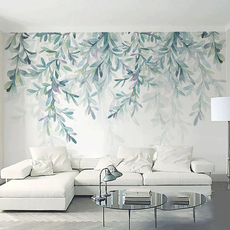 Papier peint panoramique Rameaux d'eucalyptus aquarelle : rameaux d'eucalyptus vert d'eau suspendus sur fond blanc, à l'aquarelle, posé dans un salon