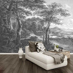 Papier peint panoramique Forêt ancienne noir et blanc : sous-bois gravé en noir et blanc, grands arbres et vallée, posé dans un salon