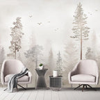 Papier peint panoramique Forêt brumeuse aux oiseaux : pins et sapins dans une brume grège rosée, vol d'oiseaux, posé dans un salon