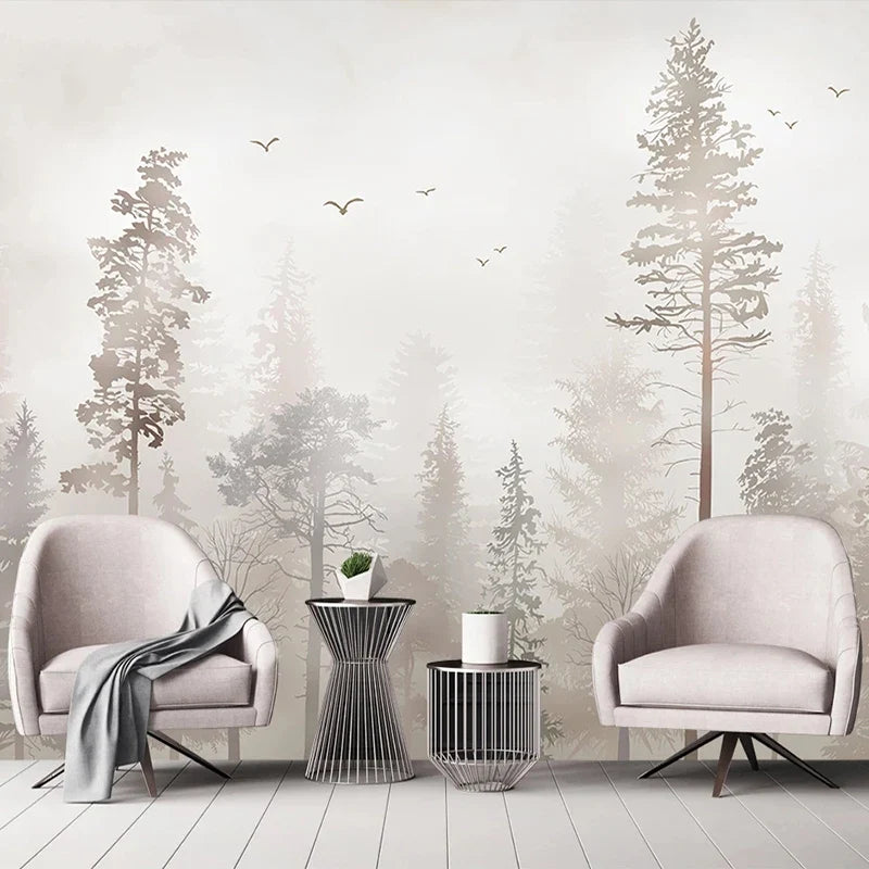 Papier peint panoramique Forêt brumeuse aux oiseaux : pins et sapins dans une brume grège rosée, vol d'oiseaux, posé dans un salon
