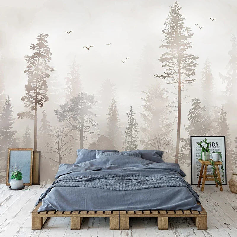 Papier peint panoramique Forêt brumeuse aux oiseaux : pins et sapins dans une brume grège rosée, vol d'oiseaux, posé dans une chambre