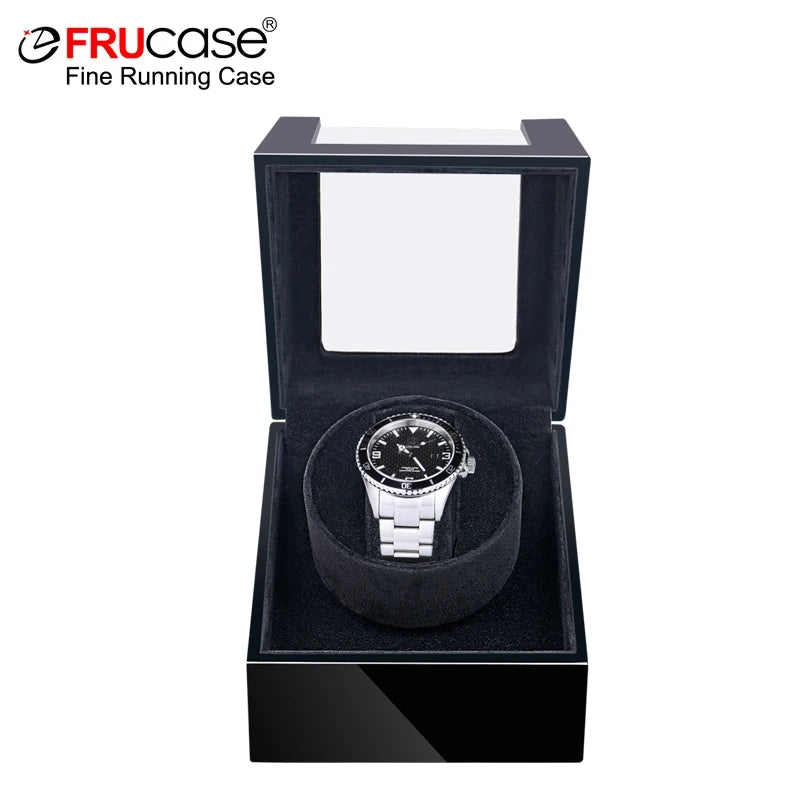 Remontoir une montre, laque noire, couvercle ouvert