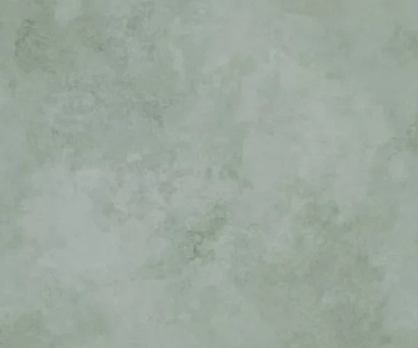 Papier peint effet béton ciré vert sauge : détail de la matière, nuances du béton ciré vert sauge