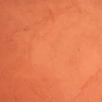 Papier peint effet enduit terre cuite : détail de la matière, enduit nuancé couleur terre cuite