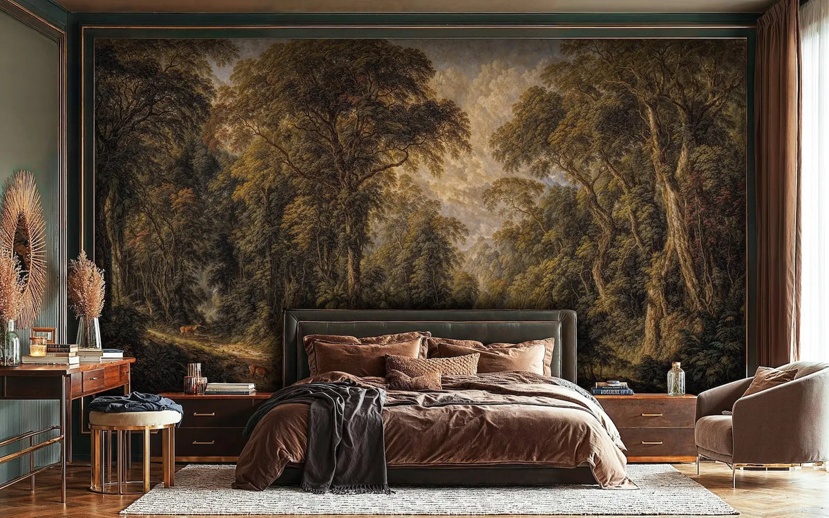 Papier peint panoramique Forêt profonde ambrée, peinture ancienne : forêt profonde aux tons ambrés derrière un lit aux draps chocolat, bureau et fauteuil en velours