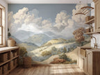 Papier peint panoramique Collines et nuages peints : collines et nuages peints sur le mur d'une cuisine en bois