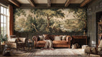 Papier peint panoramique Verdure au faisan, tapisserie ancienne : verdure au faisan façon tapisserie ancienne au-dessus d'un canapé Chesterfield, boiseries sombres