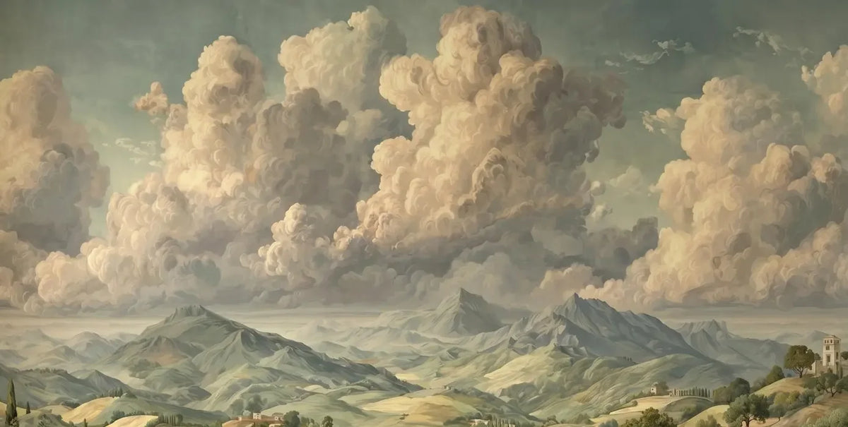 Papier peint panoramique Vallée sous les nuages dorés : vue du motif, grands nuages dorés au-dessus d'une vallée verte et de montagnes bleutées
