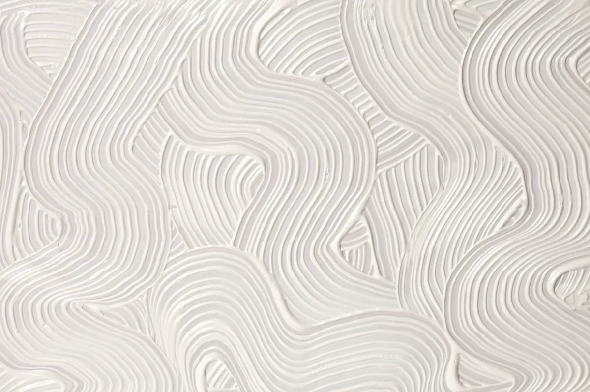 Papier peint effet plâtre peigné blanc cassé : vue à plat du motif, effet plâtre peigné blanc cassé