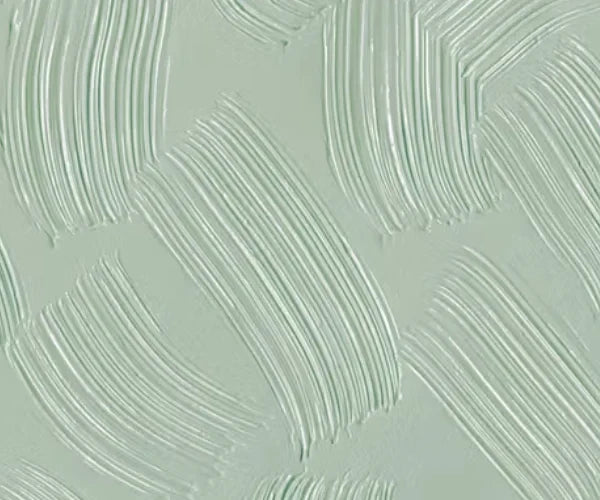 Papier peint effet plâtre peigné vert sauge : détail de la matière, stries du plâtre peigné vert sauge