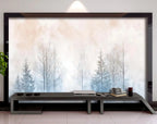 Papier peint panoramique Forêt d'hiver aquarelle pastel : bouleaux nus et sapins bleutés dans une brume rose et bleu pâle, posé au-dessus d'un meuble bas