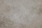 Papier peint effet béton ciré grège : vue du motif, béton ciré grège aux nuances taupe et sable