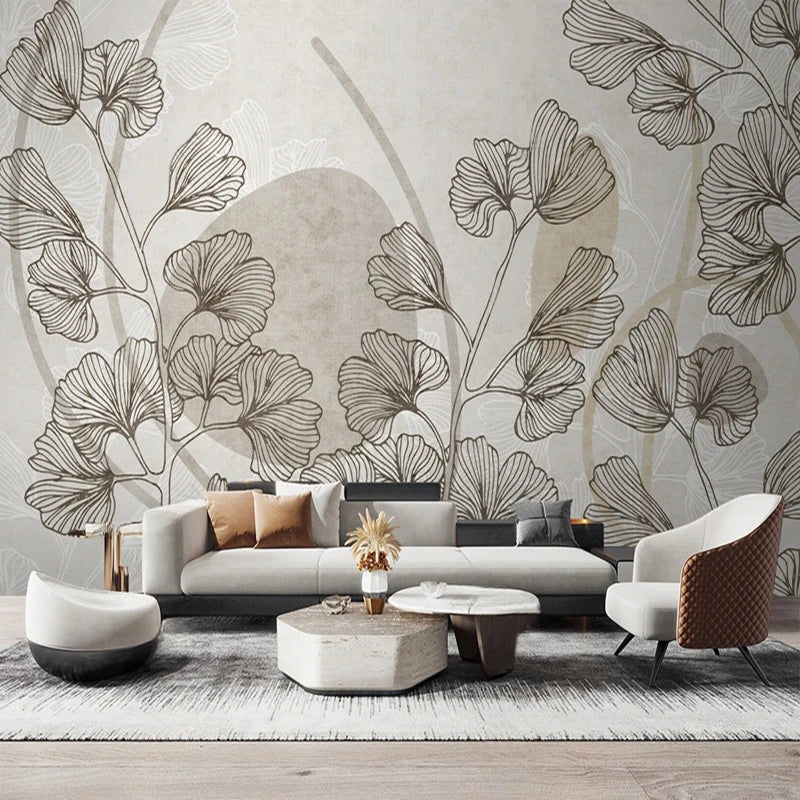 Papier peint panoramique Feuilles de ginkgo et formes sable : feuilles de ginkgo et formes sable dans un salon clair