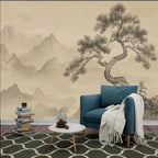 Papier peint panoramique Pin et montagnes à l'encre sépia : pin tortueux et montagnes à l'encre sur fond sépia, derrière un fauteuil bleu canard