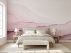 Papier peint effet dégradé rose poudré posé dans une chambre lumineuse
