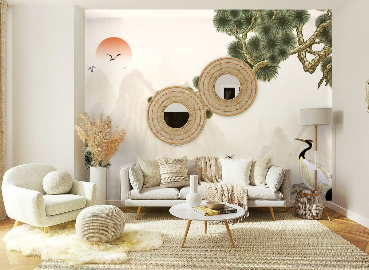 Papier peint panoramique Chinoiserie pins et grues sable posé sur le mur d’un salon