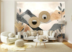 Papier peint panoramique Collines terracotta et encre posé sur le mur d’un salon