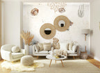 Papier peint panoramique Coquillages et étoile de mer fond sable posé sur le mur d’un salon