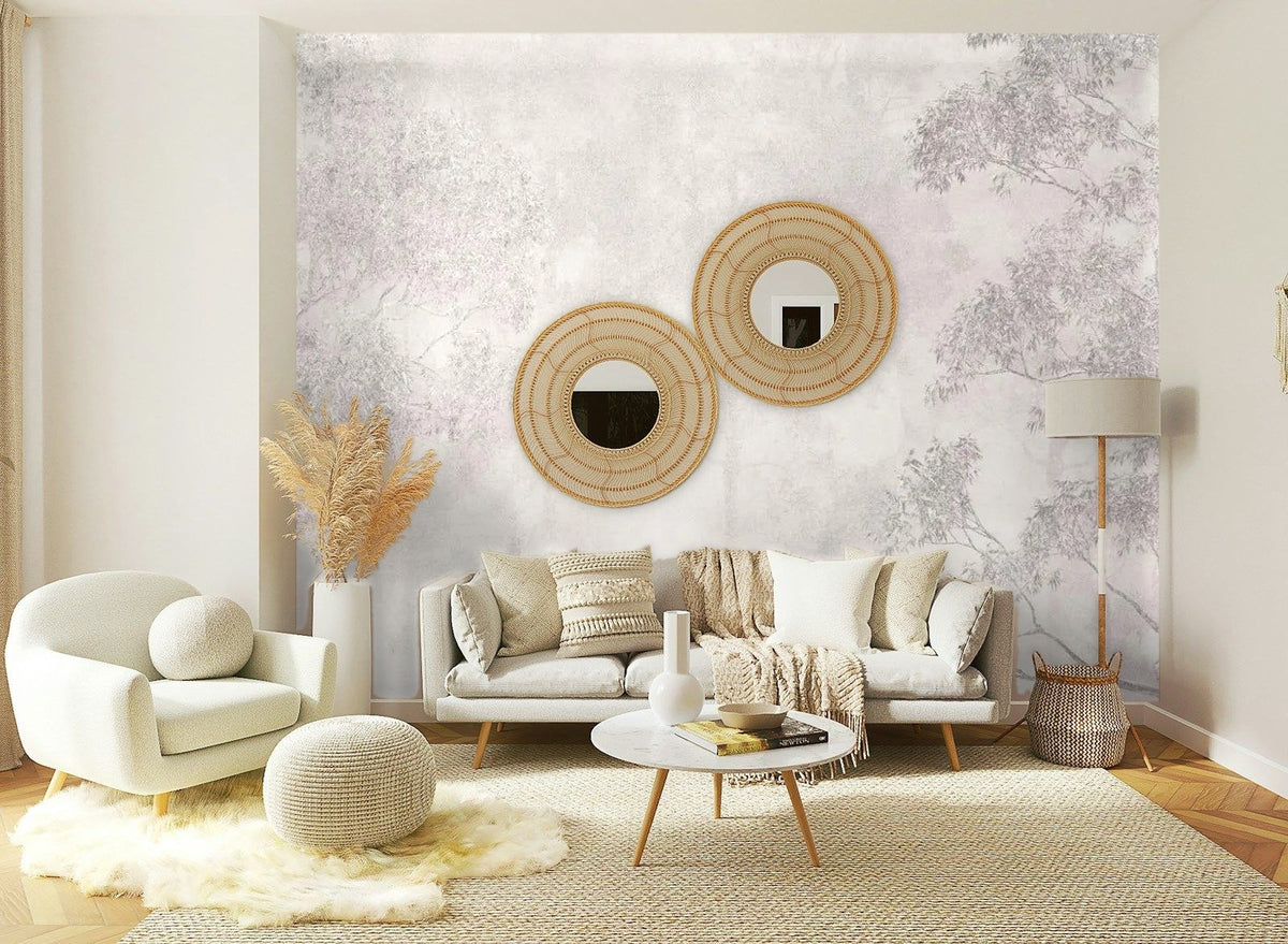Papier peint panoramique Frondaisons dans la brume rose poudré posé sur le mur d’un salon