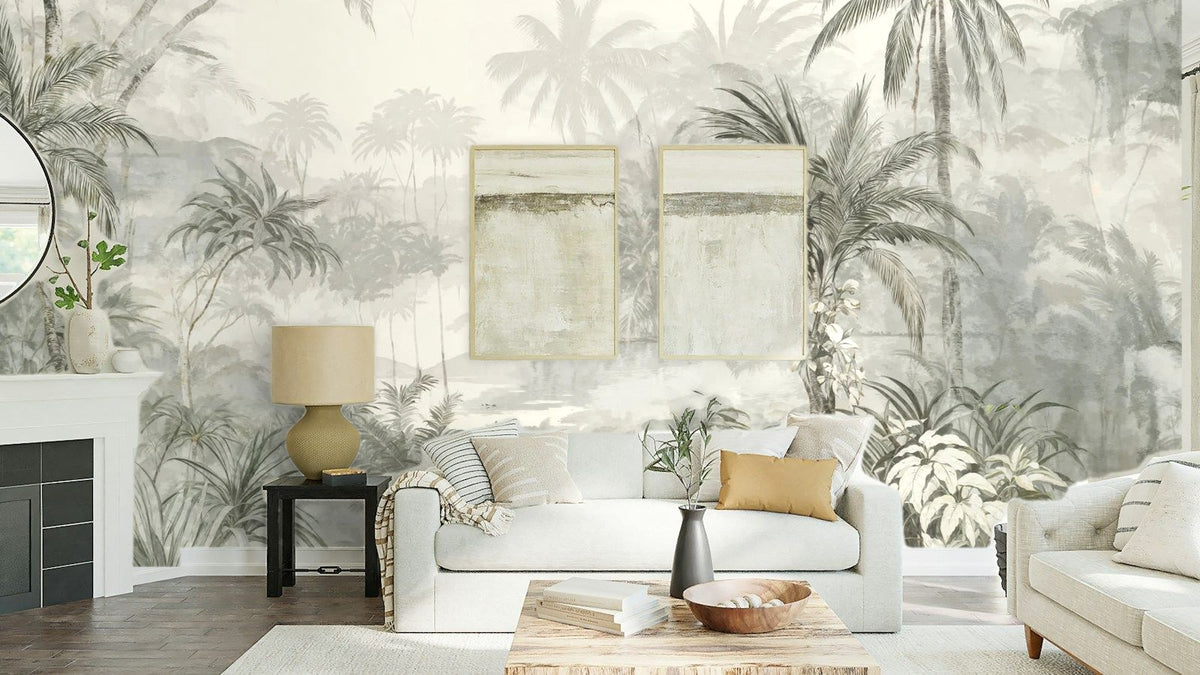 Papier peint panoramique Jungle dans la brume vert sauge posé au-dessus du canapé d’un séjour