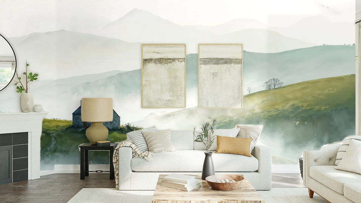 Papier peint panoramique Maison sur la colline dans la brume posé au-dessus du canapé d’un séjour