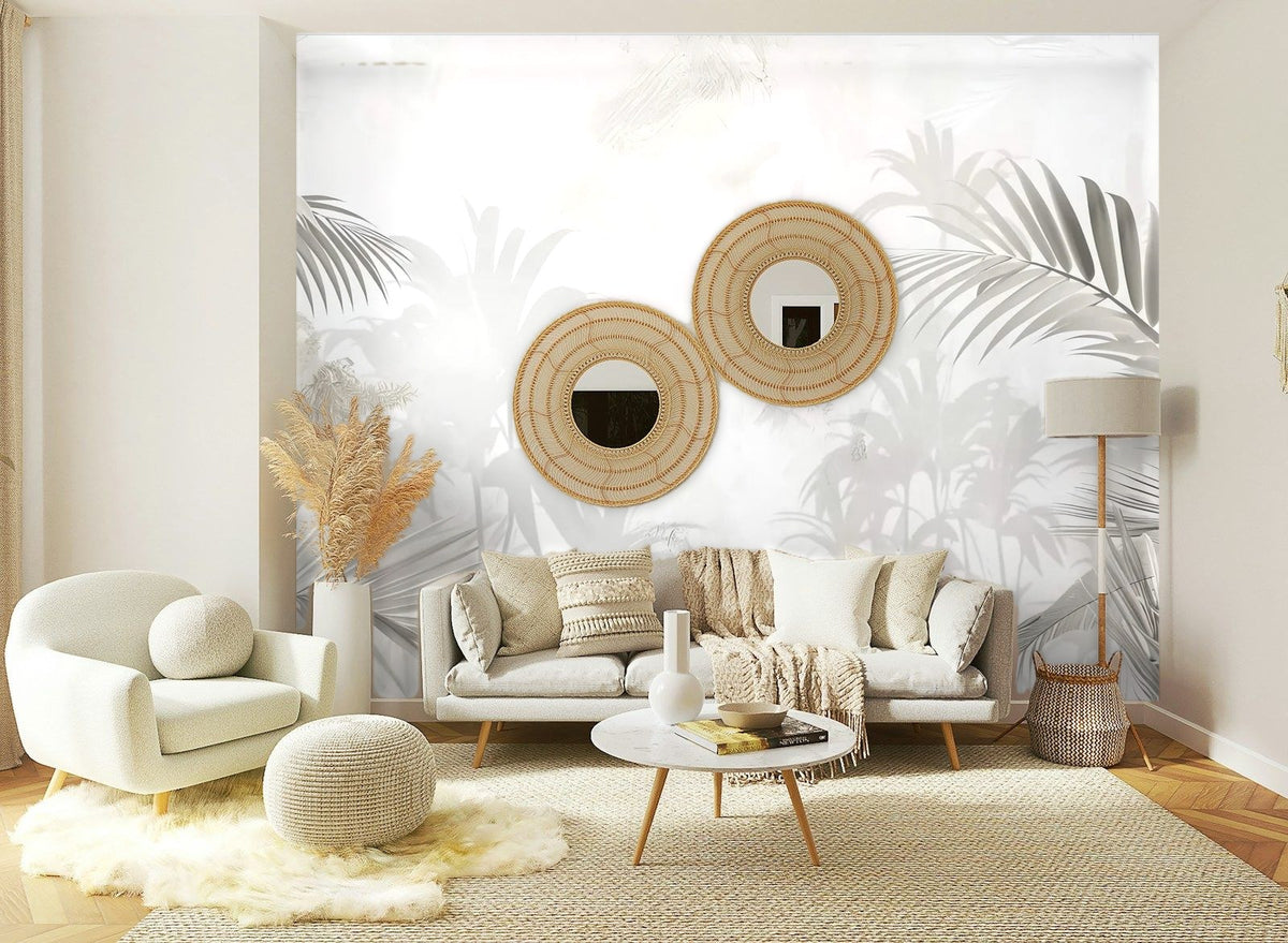 Papier peint panoramique Palmiers dans la brume beige posé sur le mur d’un salon
