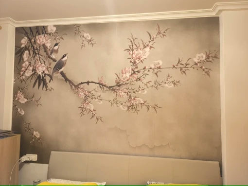 Papier peint Branche fleurie et mésanges posé chez un client de notre atelier