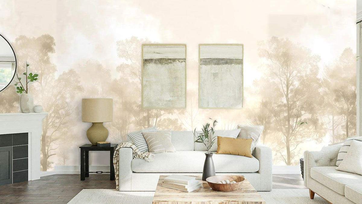 Papier peint panoramique Rangée d'arbres dans la brume dorée posé au-dessus du canapé d’un séjour