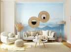 Papier peint panoramique Vallées bleu pâle dans la brume posé sur le mur d’un salon