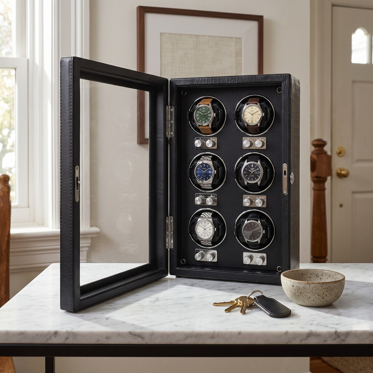 Remontoir Barillet 6 montres, posé sur une console d'entrée