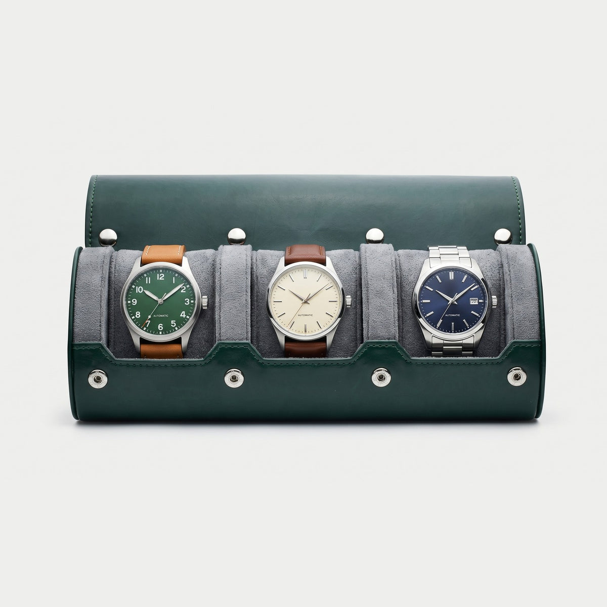 Rouleau Nomade trois montres, façon cuir vert, intérieur gris, trois montres en place